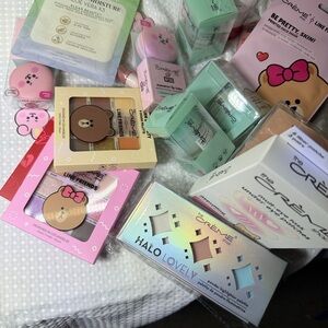 100 piece The Crème Shop granted eye shadow face masks lip balm and a lot more